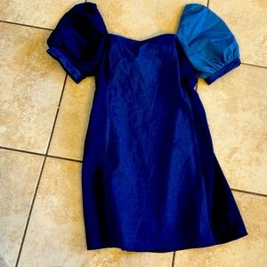 Denim dress with slightly open back.